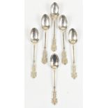 HENRY MATTHEWS; a set of six George V hallmarked silver teaspoons with cast floral detail to