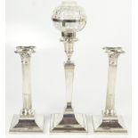 HAWKSWORTH, EYRE & CO LTD; a pair of George V hallmarked silver Corinthian column candlesticks on