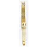 JOBO; a lady's yellow metal wristwatch and mesh strap, the square dial set with batons, stamped