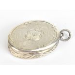 FREDERICK MARSON; a Victorian hallmarked silver vinaigrette of oval form, with engine turned