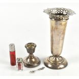 A small group of variously hallmarked silver items including a George V hallmarked silver spill vase