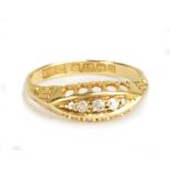 An 18ct yellow gold and diamond five stone ring, size O, approx 2.4g.Additional InformationThe