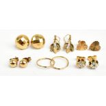 Six pairs of yellow metal ear studs and earrings including a pair of 9ct yellow gold hoops (6).