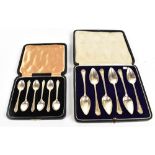 JOSIAH WILLIAMS & CO; a set of six George V hallmarked silver grapefruit spoons with cast handle,