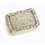 NATHANIEL MILLS; a George III hallmarked silver vinaigrette of shaped rectangular form with cast and