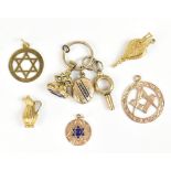 A group of yellow metal jewellery, including two 9ct pendants, one with Masonic symbol, yellow metal
