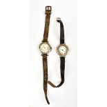 Two lady's silver cased wristwatches on leather straps, the enamelled dials set with Roman