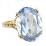 A 9ct yellow gold dress ring, set with a large blue synthetic stone, size M, approx 4.3g.