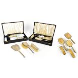 ARTHUR COOK; a hallmarked silver and guilloche enamelled five piece dressing table set, comprising