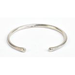 GEORG JENSEN; a silver torque bangle, fully marked and no.150, external width 7cm, internal width