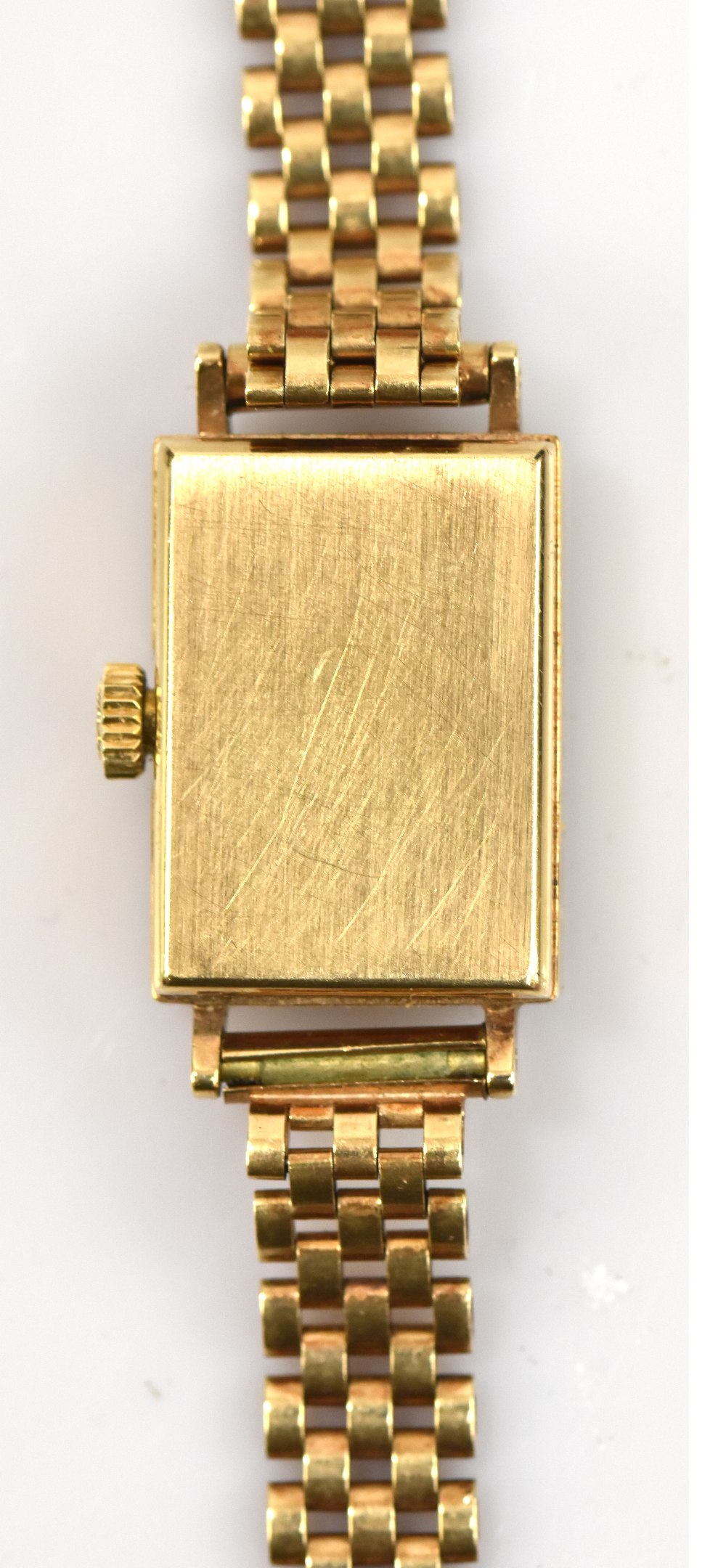 LONGINES; a lady's 9ct gold wristwatch, the rectangular dial set with batons, with 9ct gold strap, - Image 5 of 7