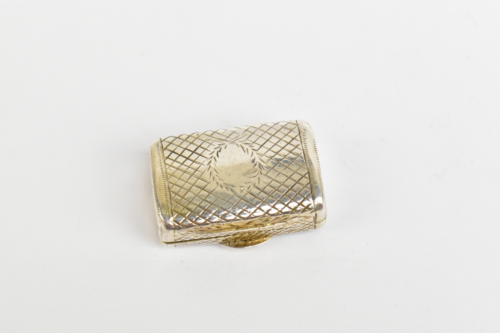 A George VI hallmarked silver vinaigrette in the form of a purse with chased detail, the hinged - Image 3 of 6