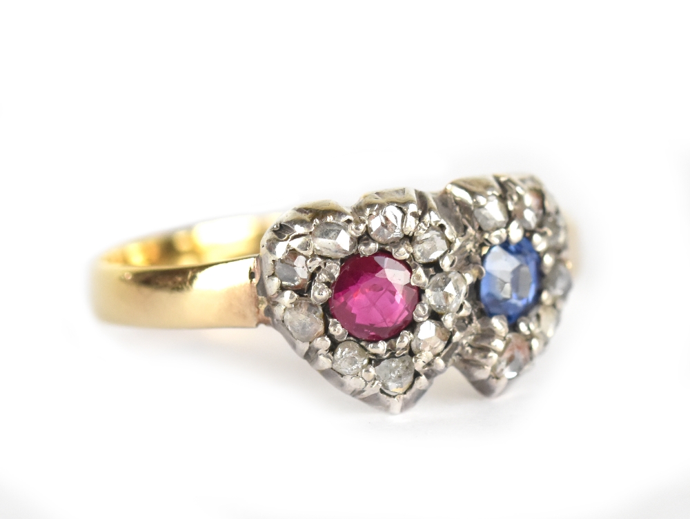 A Victorian 18ct yellow gold ruby and sapphire double heart ring, each heart set with mine cut