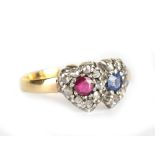 A Victorian 18ct yellow gold ruby and sapphire double heart ring, each heart set with mine cut