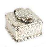 A 19th century hallmarked silver travelling inkwell, with engraved initials beneath a coronet to the