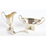 VINERS LTD; a George VI hallmarked silver three piece strawberry set, comprising sifting spoon,