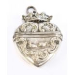 A 19th century French white metal vinaigrette in the form of a love heart, with crown surmount and