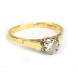 An 18ct yellow gold and diamond solitaire ring, the diamond weighing approx 0.60cts, in eight claw