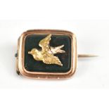 A Victorian yellow metal vinaigrette brooch, with hardstone and yellow mount depicting a bird in