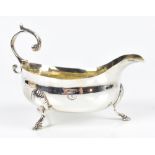 ***WITHDRAWN*** STEVEN ADAM II; a George III hallmarked silver small sauce boat with high loop