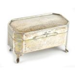 WALKER & HALL; a George V hallmarked silver trinket box of rectangular form with canted corners, the