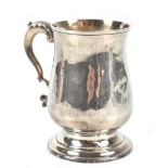 GEORGE SMITH II; a George III hallmarked silver mug of baluster form with scrolling loop handle