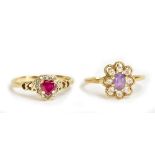 A 9ct yellow gold dress ring with heart-shaped pink central stone and pierced shoulders, size R