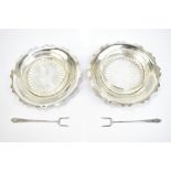 E J HOULSTON; a cased pair of George VI hallmarked silver and clear glass butter/preserve dishes,