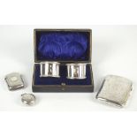 A small group of hallmarked silver items including an Edward VII hallmarked silver cigarette case,