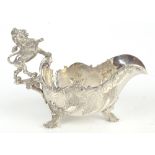 C.J. VANDER; a large and impressive Elizabeth II hallmarked silver gravy/sauce boat with lion