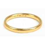 A 22ct yellow gold wedding band, size O, approx 3.4g.Additional InformationGeneral wear, minor