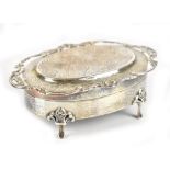 HENRY MATTHEWS; an Edwardian hallmarked silver trinket box of oval form, the engraved hinged lid