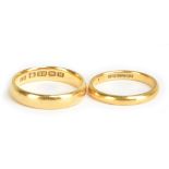 Two 22ct yellow gold wedding bands, size Q and L 1/2, approx 9.4g (2).Additional InformationMinor
