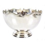 HERBERT EDWARD BARKER & FRANK ERNEST BARKER; a George V hallmarked silver punch bowl with shaped