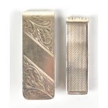 M KAMIN & CO LTD; an Elizabeth II hallmarked silver money clip with chased detail, Birmingham