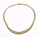 A triple tone 9ct yellow gold choker necklace, length 40cm, approx 32.7g.Additional InformationLight