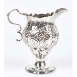 NATHANIEL APPLETON & ANN SMITH; a George III hallmarked silver helmet shaped cream jug, with