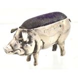 SYDNEY & CO; an Edward VII hallmarked silver novelty pin cushion modelled in the form of a pig,