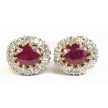 A pair of 18ct yellow gold ruby and diamond cluster earrings, approx 4.3g.Additional