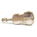 A mid to late 20th century silver plated vesta case in the form of a cello, length 6.5cm.