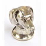 BAC; an Elizabeth II hallmarked silver novelty vesta case in the form of a dogs head, London 1979,