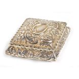 DEAKIN & FRANCIS; a late Victorian hallmarked silver lozenge shaped trinket box, with scrolling leaf