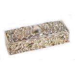 RIDLEY & HAYES; a Victorian hallmarked silver trinket box of rectangular form, with foliate scroll