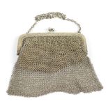 A silver mesh purse with import marks and kid leather lining, 10.5 x 10cm, combined 2.09ozt/65.1g.
