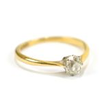 An 18ct yellow gold and cushion claw set diamond solitaire ring, size L, approx 1.5g, boxed.