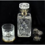 JB CHATTERLEY & SONS LTD; an Elizabeth II cut glass decanter and stopper with hallmarked silver