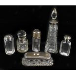 Six cut glass silver mounted dressing table items, including an atomiser (af), rectangular jar and