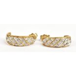A pair of 9ct yellow gold and diamond hoop earrings, length 2cm, approx 3.1g.Additional
