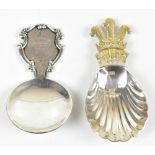 ROBERTS & BELK; an Elizabeth II hallmarked silver caddy spoon, with gilt crown finial and shell