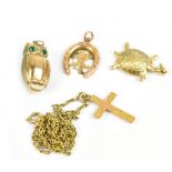 A small group of jewellery including a 9ct yellow gold owl charm, a 9ct yellow gold cross on